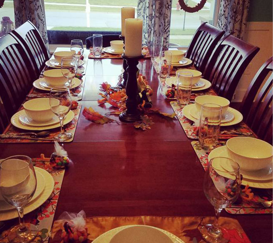 photo of a dining table set for thanksgiving