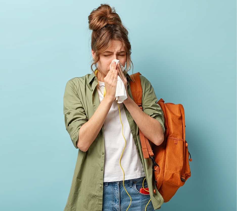 woman sneezing