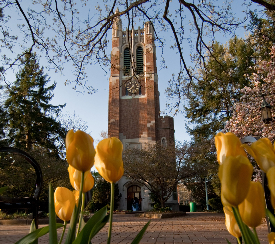 photo of Beaumont Tower with Tulips blooming in front.