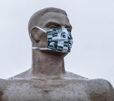 Photo of the Spartan statue with a mask on