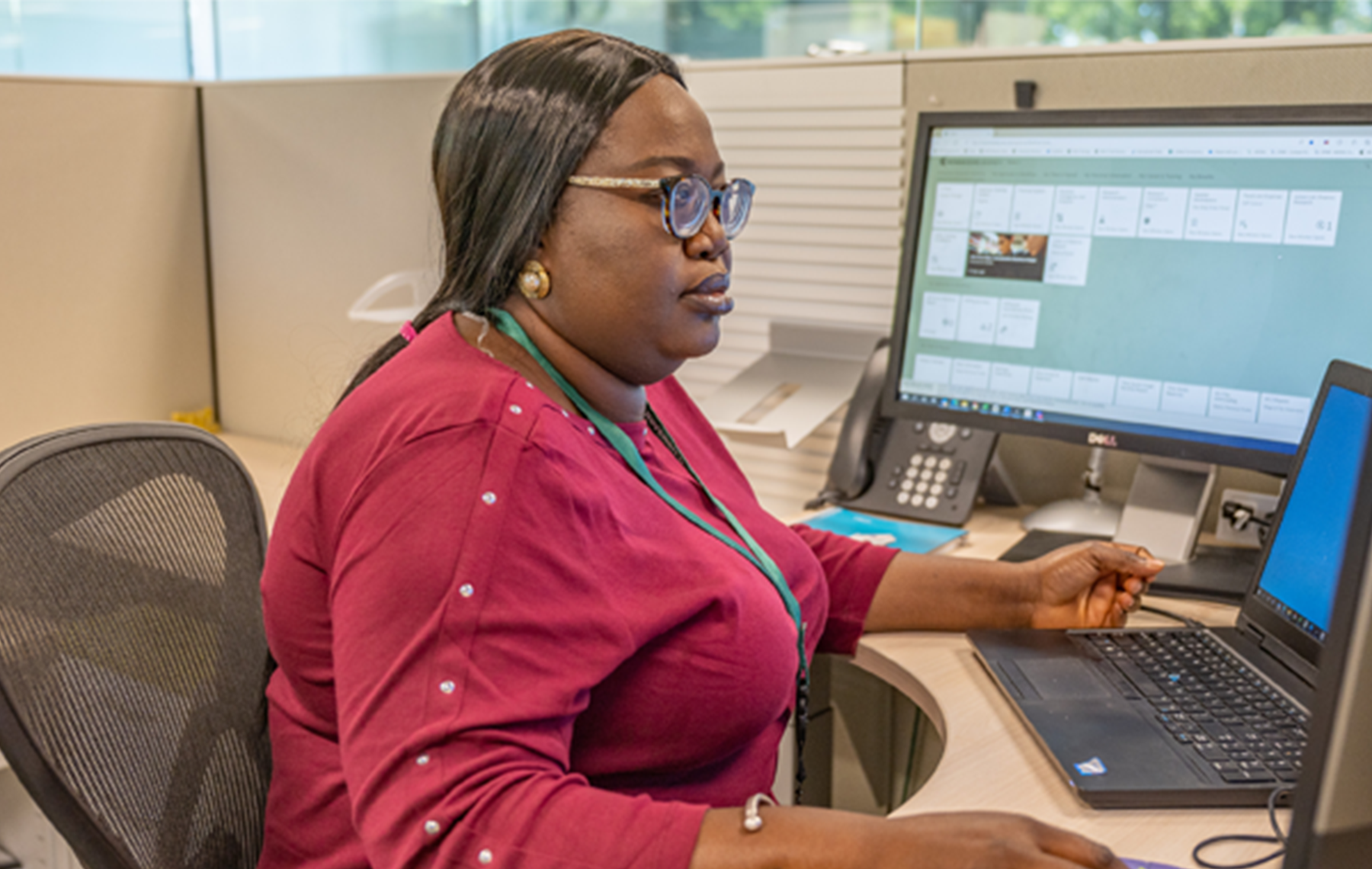 MSU employee working on a computer